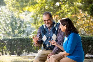 Senior couple smiling and conversing